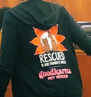 Volunteers wear "Rescued is my favorite breed.  Good Karma Pet Rescue" jacket at Broward Commission meeting today. 