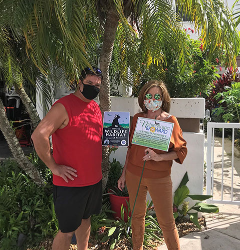 COVID Re-LEAF rain barrel contest winner: Curtis Hood with presenter Rose Bechard Butman