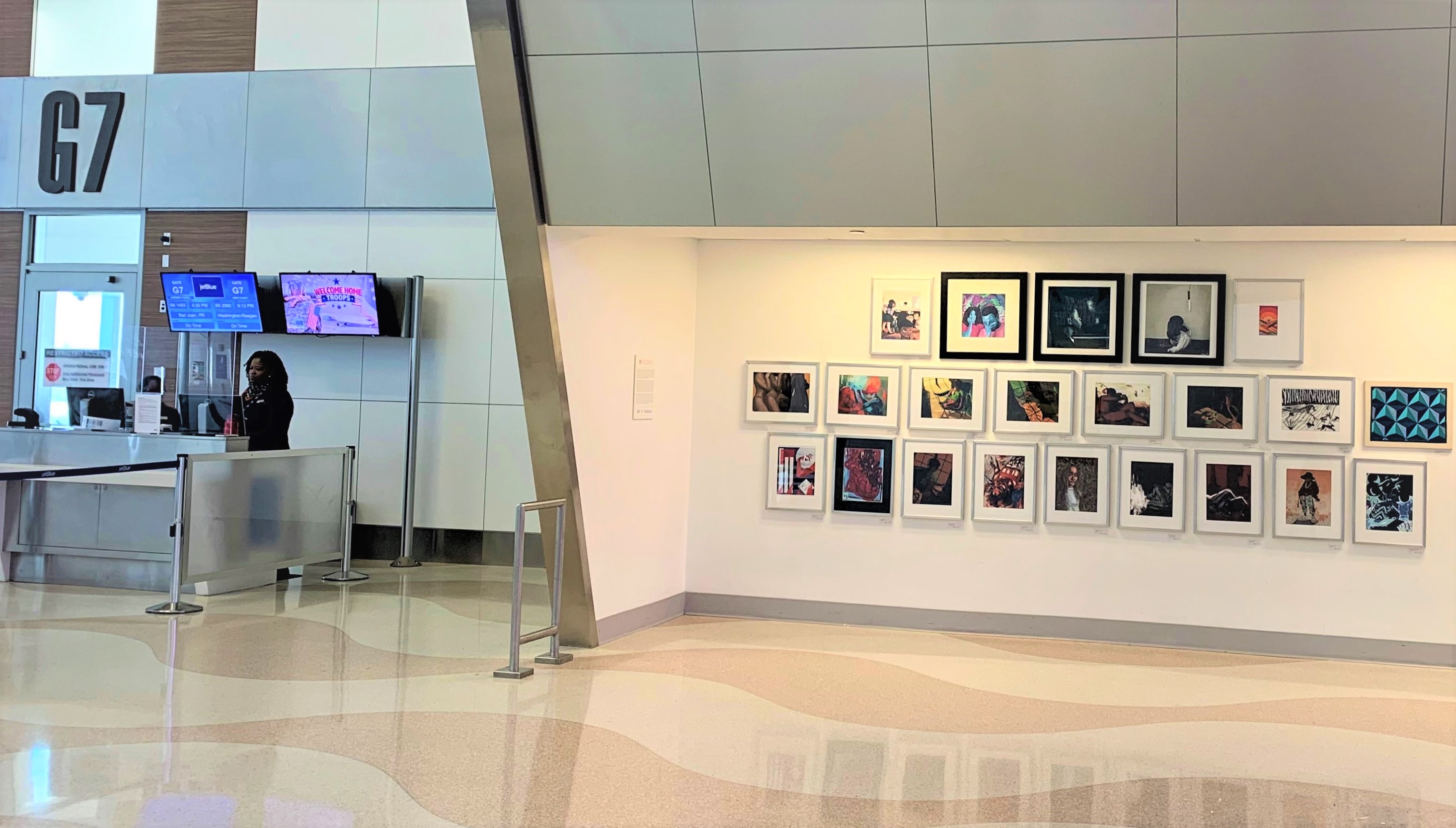 The exhibition is located in Terminal 4, Concourse G (post-security) and features high-quality giclee prints of artworks in various mediums.