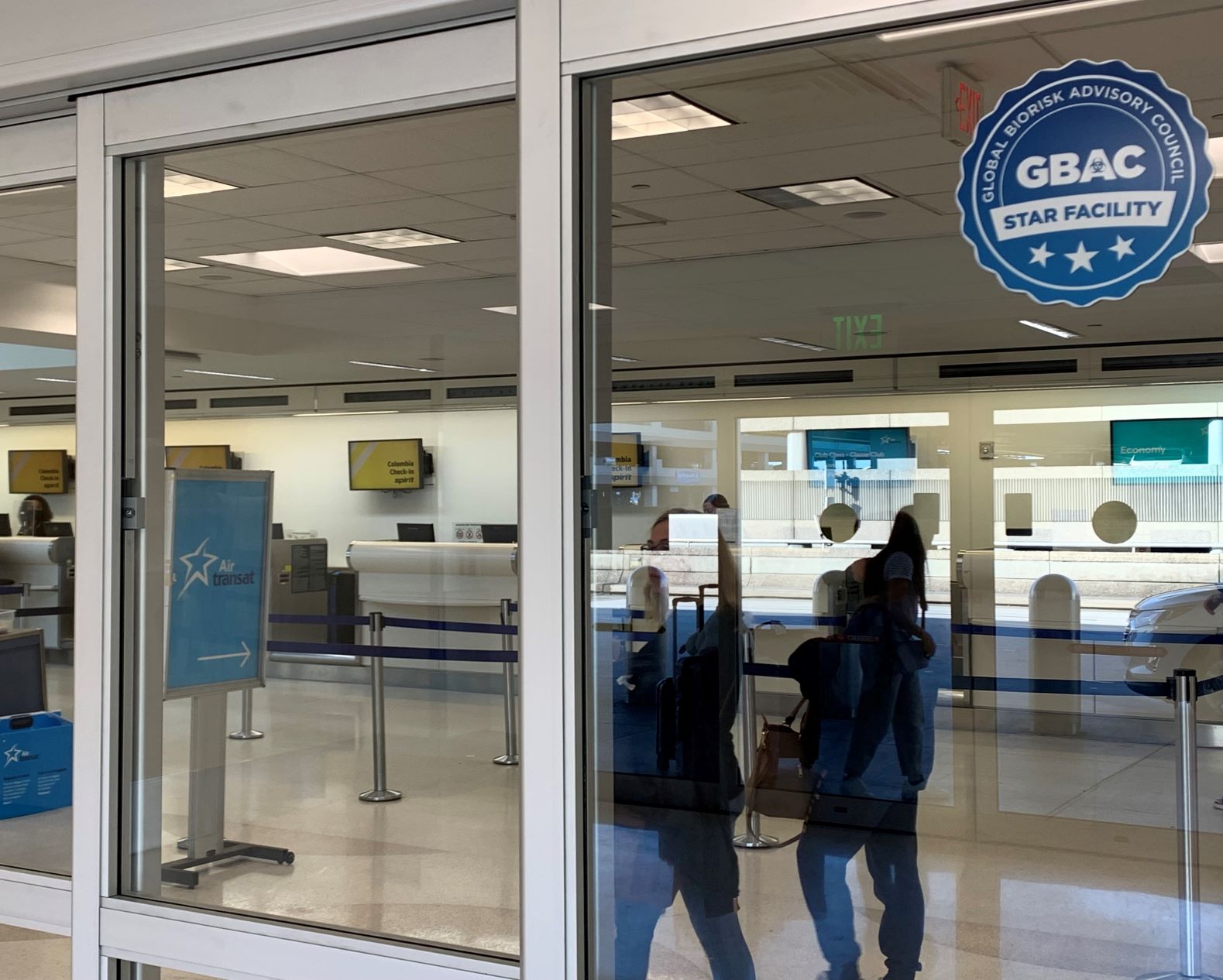 GBAC Star Facility Accreditation Sticker on display on a Terminal 4 entrance door at the Fort Lauderdale-Hollywood International Airport.