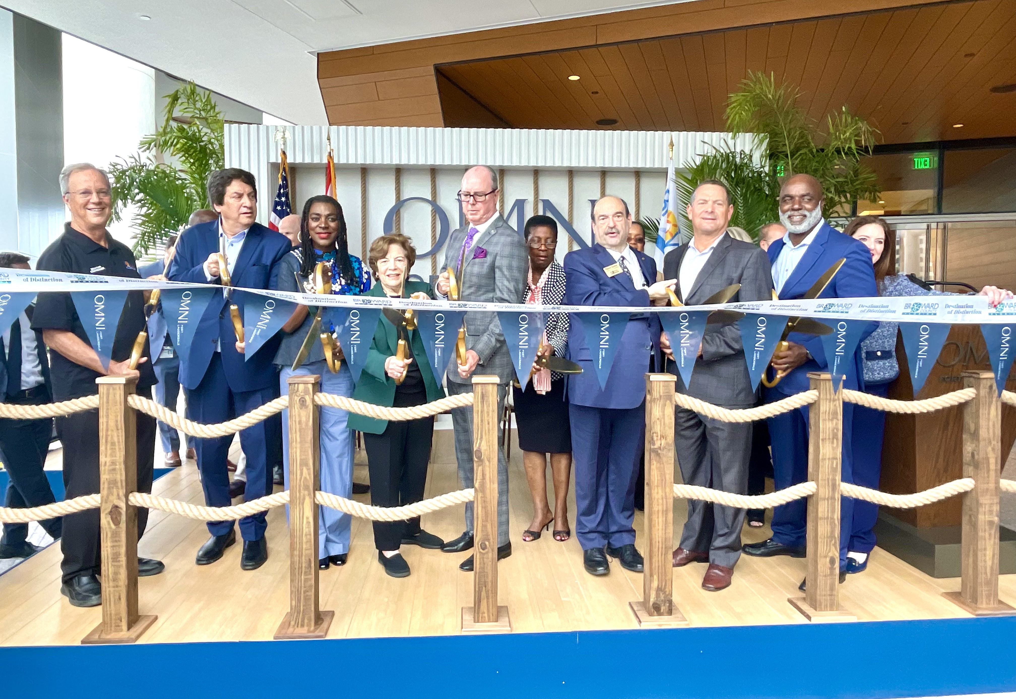 Broward Commissioners cut the ribbon to officially open the Omni Fort Lauderdale Hotel. (Left to Right) Commissioner Beam Furr, Mayor Mark Bogen, Commissioners Alexandra Davis, Nan Rich, Lamar Fisher, Hazelle Rogers, Steve Geller, Michael Udine, Vice Mayor Robert McKinzie and County Administrator Monica Cepero. 