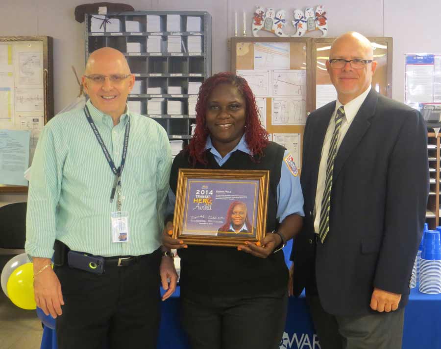 Jeff Marder, Bus Operations Superintendent, Bus Operator Kiesha Rule, and Transit Director Tim Garling.